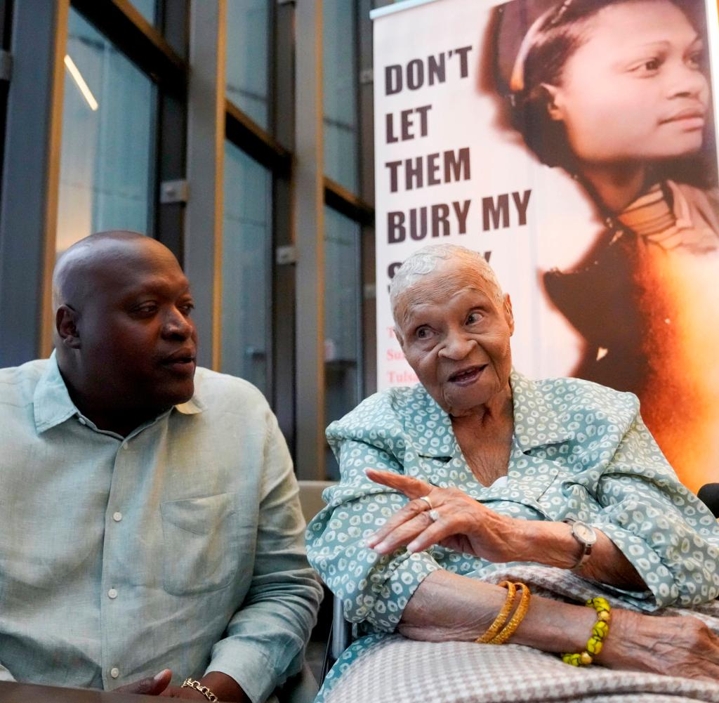 Viola Ford Fletcher, a survivor of the massacre, with her grandson during an interview in June