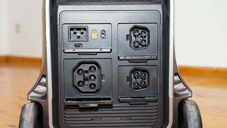 The back with charging ports and sockets for additional batteries.